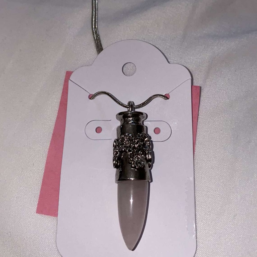Pink crystal necklace with silver design